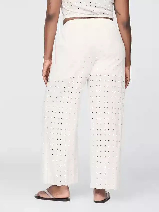 Pantalon ample à taille mi-haute et œillets