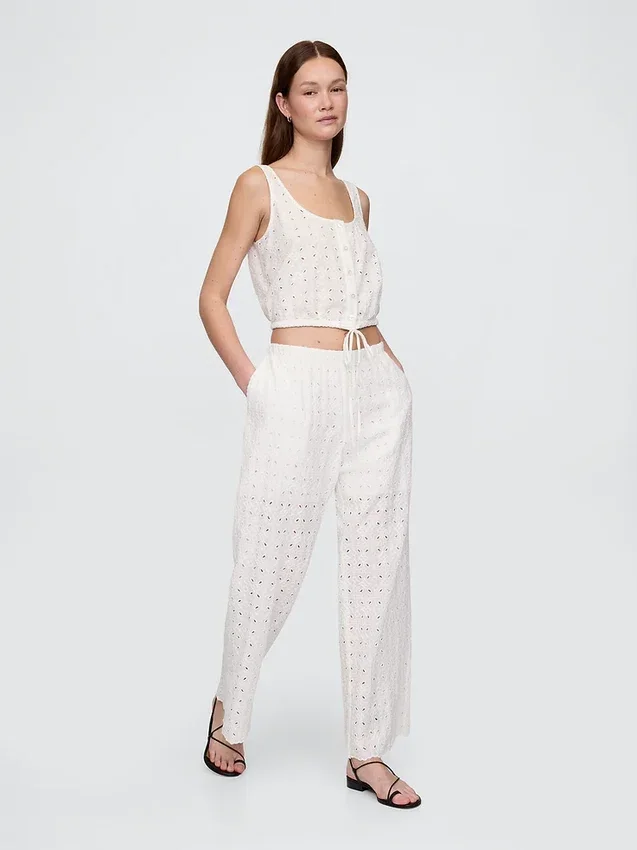 Pantalon ample à taille mi-haute et œillets