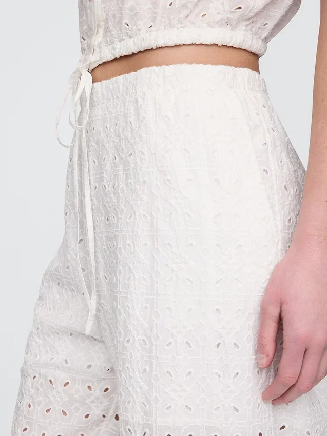 Pantalon ample à taille mi-haute et œillets