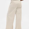 Pantalon baggy en velours côtelé à taille moyenne
