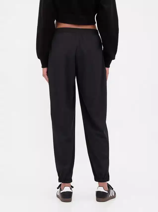 Pantalon de jogging GapFit Tech à taille haute et ourlet zippé