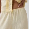 Pantalon de pyjama en mélange de lin à ourlet en dentelle
