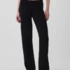Pantalon de type « bootcut » en maille épaisse, taille basse, en mélange de coton