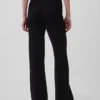 Pantalon de type « bootcut » en maille épaisse, taille basse, en mélange de coton