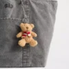 Pendentif pour sac « Brannan Bear » avec écharpe d’écharpe