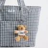 Pendentif pour sac « Brannan Bear » en T-shirt