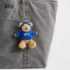 Pendentif pour sac « Brannan Bear Nap » avec capuche