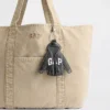 Pendentif pour sac à capuche avec logo