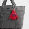 Pendentif pour sac à capuche avec logo