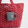 Pendentif pour sac fourre-tout avec logo