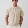 Polo-pull oversize à poche et fermeture à quart de zip