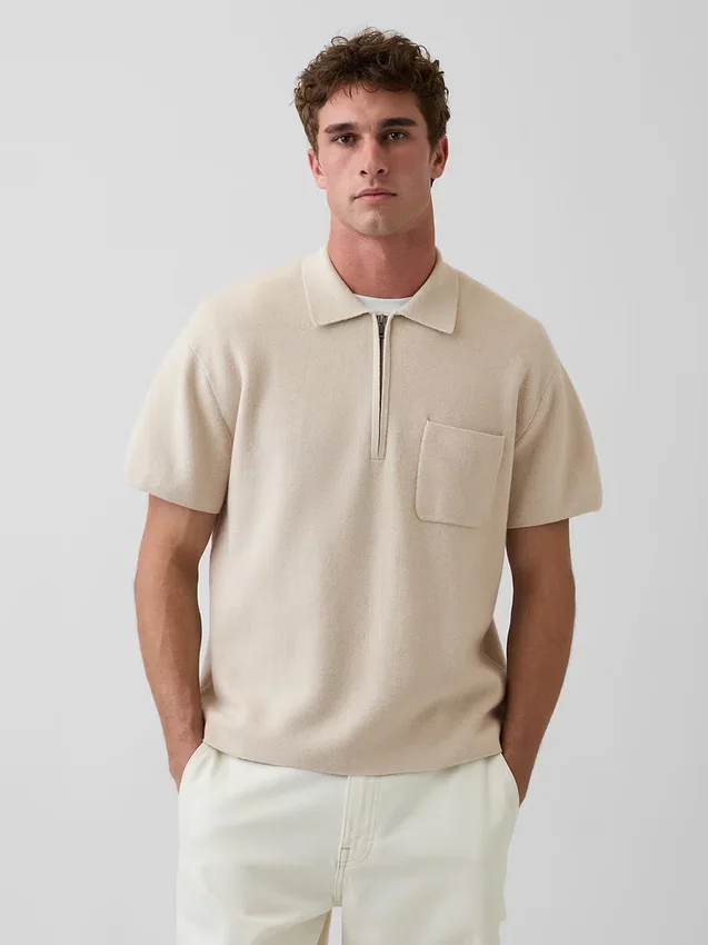 Polo-pull oversize à poche et fermeture à quart de zip