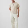 Polo-pull oversize à poche et fermeture à quart de zip