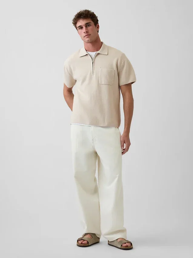 Polo-pull oversize à poche et fermeture à quart de zip