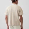 Polo-pull oversize à poche et fermeture à quart de zip