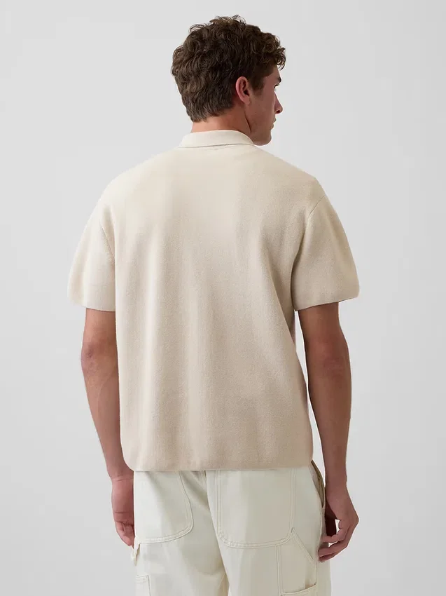 Polo-pull oversize à poche et fermeture à quart de zip