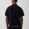 Polo-pull oversize à poche et fermeture à quart de zip