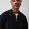 Polo-pull oversize à poche et fermeture à quart de zip