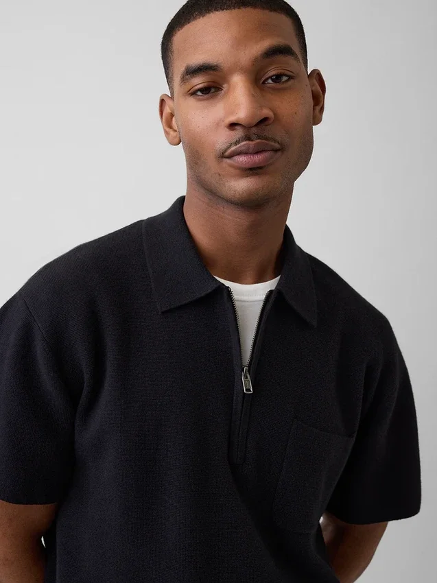 Polo-pull oversize à poche et fermeture à quart de zip