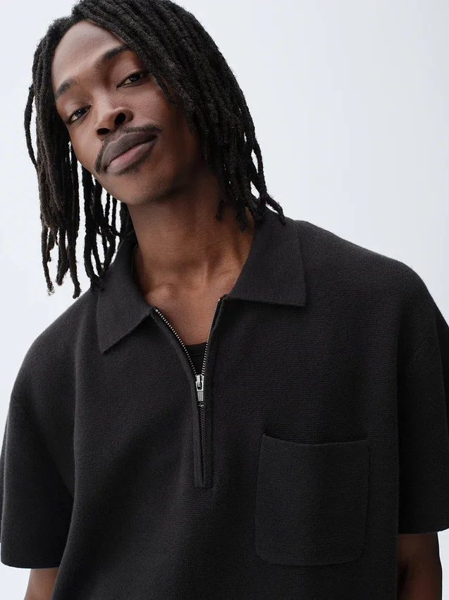 Polo-pull oversize à poche et fermeture à quart de zip