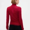 Pull à col roulé en maille pointelle