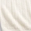 Pull à col roulé en maille pointelle
