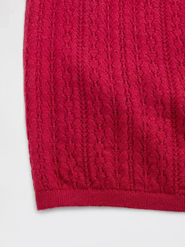 Pull à col roulé en maille pointelle