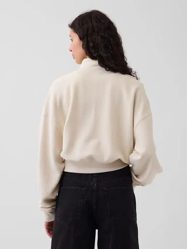 Pull oversize en coton texturé à demi-zip