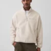 Pull oversize en sherpa à demi-zip