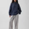 Pull épais oversize à logo et fermeture à glissière quart de longueur