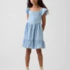 Robe en denim à manches flottantes et encolure en cœur