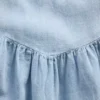 Robe en denim à manches flottantes et encolure en cœur
