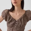 Robe longue à col en V et ourlet à volants