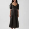 Robe longue corset à manches bouffantes