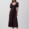 Robe longue corset à manches bouffantes