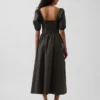 Robe longue corset à manches bouffantes