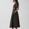 Robe longue corset à manches bouffantes