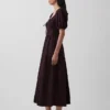 Robe longue corset à manches bouffantes