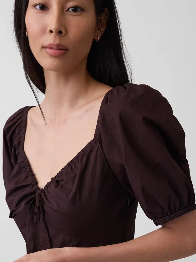 Robe longue corset à manches bouffantes