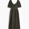 Robe longue corset à manches bouffantes
