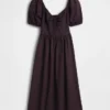 Robe longue corset à manches bouffantes
