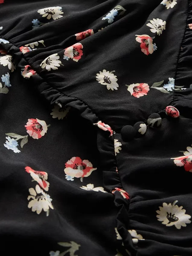 Robe longue en crêpe à encolure en cœur