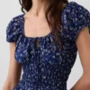 Robe longue en voile à taille smockée