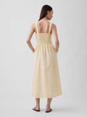 Robe longue à taille basse et coutures ajourées