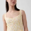 Robe longue à taille basse et coutures ajourées
