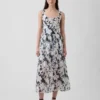 Robe longue à taille basse et coutures apparentes