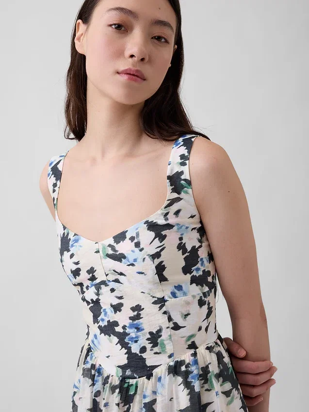 Robe longue à taille basse et coutures apparentes