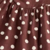 Robe longue à taille basse et coutures apparentes