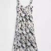 Robe longue à taille basse et coutures apparentes