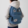 Sac à dos en denim pour enfant avec écussons